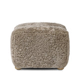 A subtle sweetheart shape paired with beige shearling plays into this ottoman's found object appeal. S-spring suspension offers a comfy place to sit and the shearling upholstery brings depth and vintage vibes throughout. Perfect styled alone or as part of a set for added drama. A design collaboration by Amber Lewis and Four Hands. Amethyst Home provides interior design, new home construction design consulting, vintage area rugs, and lighting in the Los Angeles metro area.