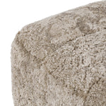 A subtle sweetheart shape paired with beige shearling plays into this ottoman's found object appeal. S-spring suspension offers a comfy place to sit and the shearling upholstery brings depth and vintage vibes throughout. Perfect styled alone or as part of a set for added drama. A design collaboration by Amber Lewis and Four Hands. Amethyst Home provides interior design, new home construction design consulting, vintage area rugs, and lighting in the San Diego metro area.