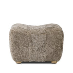 A subtle sweetheart shape paired with beige shearling plays into this ottoman's found object appeal. S-spring suspension offers a comfy place to sit and the shearling upholstery brings depth and vintage vibes throughout. Perfect styled alone or as part of a set for added drama. A design collaboration by Amber Lewis and Four Hands. Amethyst Home provides interior design, new home construction design consulting, vintage area rugs, and lighting in the Scottsdale metro area.