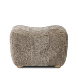 A subtle sweetheart shape paired with beige shearling plays into this ottoman's found object appeal. S-spring suspension offers a comfy place to sit and the shearling upholstery brings depth and vintage vibes throughout. Perfect styled alone or as part of a set for added drama. A design collaboration by Amber Lewis and Four Hands. Amethyst Home provides interior design, new home construction design consulting, vintage area rugs, and lighting in the Scottsdale metro area.