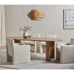 Featuring Paden Sandy Acacia Dining Table by Four Hands at Amethyst Home. A study in shape. Sand-colored acacia forms crescent-shaped legs and a sprawling oval tabletop, bringing grand, organic-infused presence to the dining room.Overall Dimensions: 94.00"w x 42.00"d x 30.00"hWeight : 139.33 lbsMaterials : Thin Acacia Veneer, Solid Acacia. Amethyst Home provides interior design, new home construction design consulting, vintage area rugs, and lighting in the Houston metro area.