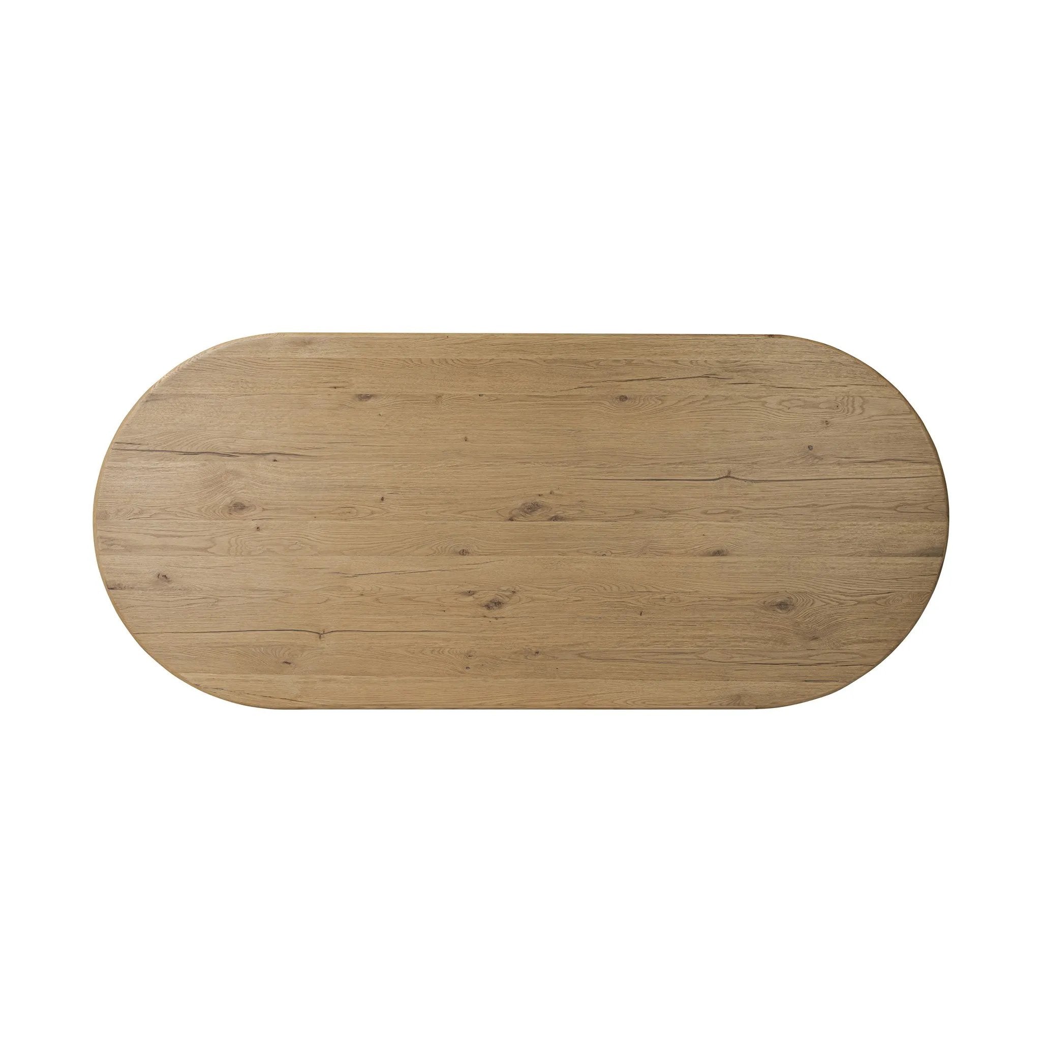 A study in shape. Solid brown oak forms crescent-shaped legs and sprawling oval tabletop, bringing organic presence to the dining room Amethyst Home provides interior design, new home construction design consulting, vintage area rugs, and lighting in the Seattle metro area.