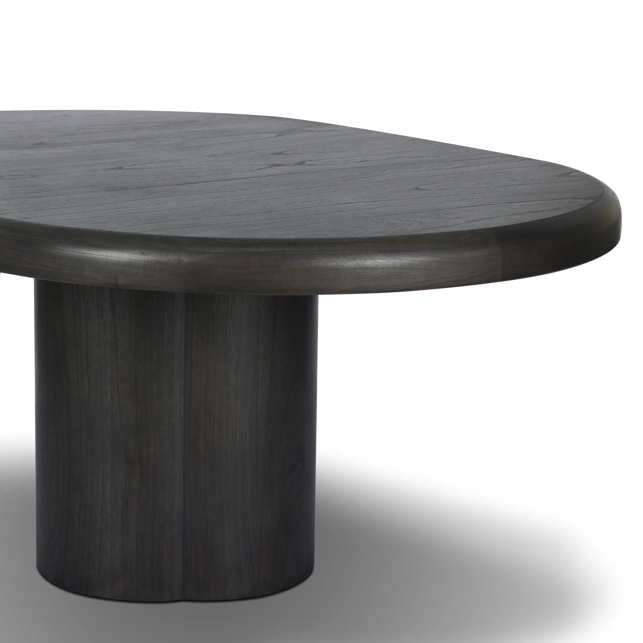Make space for more guests with a rounded extension table of smoked black mindi, with beautiful visible graining. Inside the tabletop, a hidden mechanism allows for expansion from 48" to 68".As fans of organic modern design at Amethyst, we love the designer inspired Pemble Extension Dining Table - Smoked Black Mindi Veneer. Amethyst Home provides interior design, new home construction design consulting, vintage area rugs, and lighting in the Calabasas metro area.