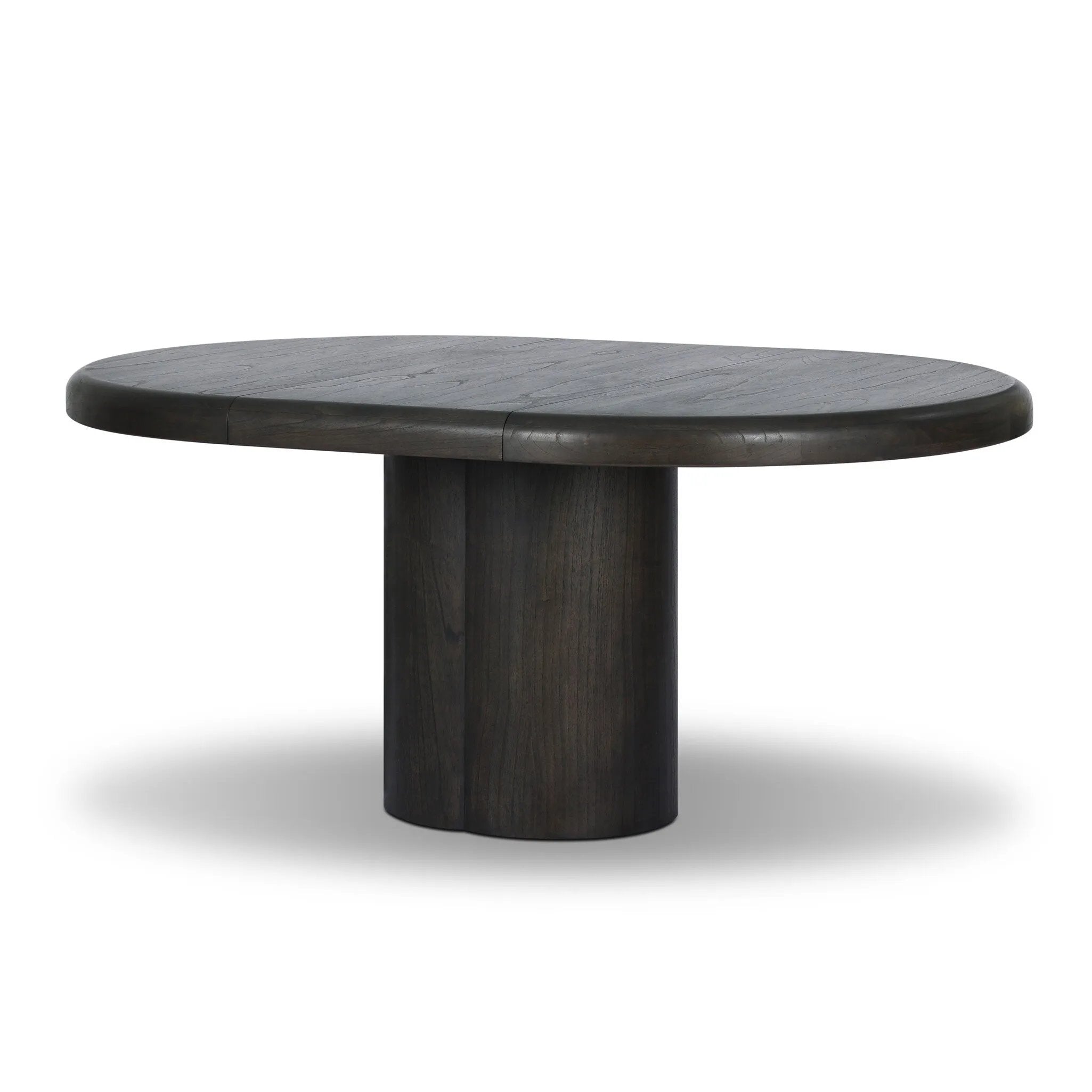 Make space for more guests with a rounded extension table of smoked black mindi, with beautiful visible graining. Inside the tabletop, a hidden mechanism allows for expansion from 48" to 68".As fans of organic modern design at Amethyst, we love the designer inspired Pemble Extension Dining Table - Smoked Black Mindi Veneer. Amethyst Home provides interior design, new home construction design consulting, vintage area rugs, and lighting in the Charlotte metro area.