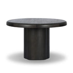 Make space for more guests with a rounded extension table of smoked black mindi, with beautiful visible graining. Inside the tabletop, a hidden mechanism allows for expansion from 48" to 68".As fans of organic modern design at Amethyst, we love the designer inspired Pemble Extension Dining Table - Smoked Black Mindi Veneer. Amethyst Home provides interior design, new home construction design consulting, vintage area rugs, and lighting in the Dallas metro area.