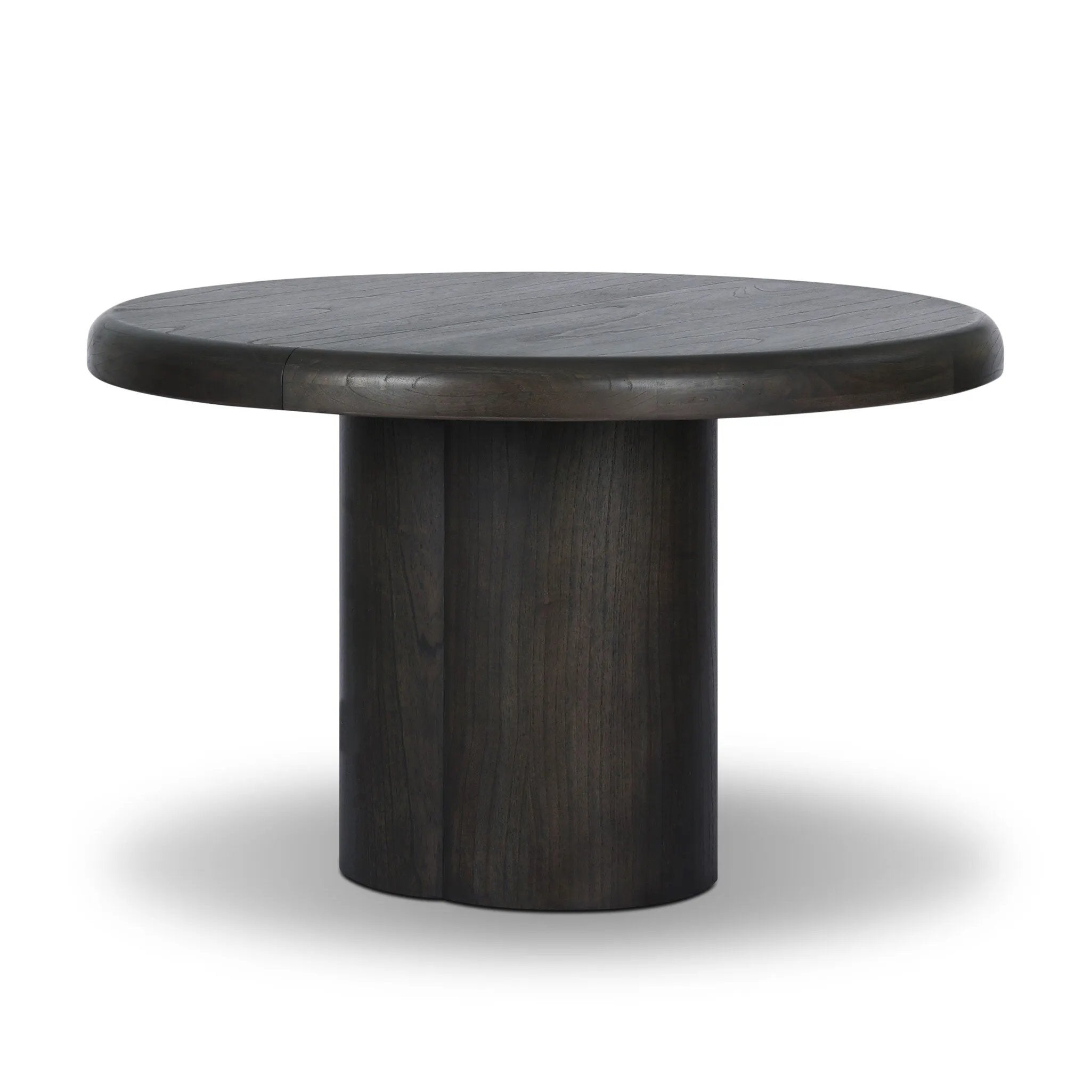 Make space for more guests with a rounded extension table of smoked black mindi, with beautiful visible graining. Inside the tabletop, a hidden mechanism allows for expansion from 48" to 68".As fans of organic modern design at Amethyst, we love the designer inspired Pemble Extension Dining Table - Smoked Black Mindi Veneer. Amethyst Home provides interior design, new home construction design consulting, vintage area rugs, and lighting in the Portland metro area.