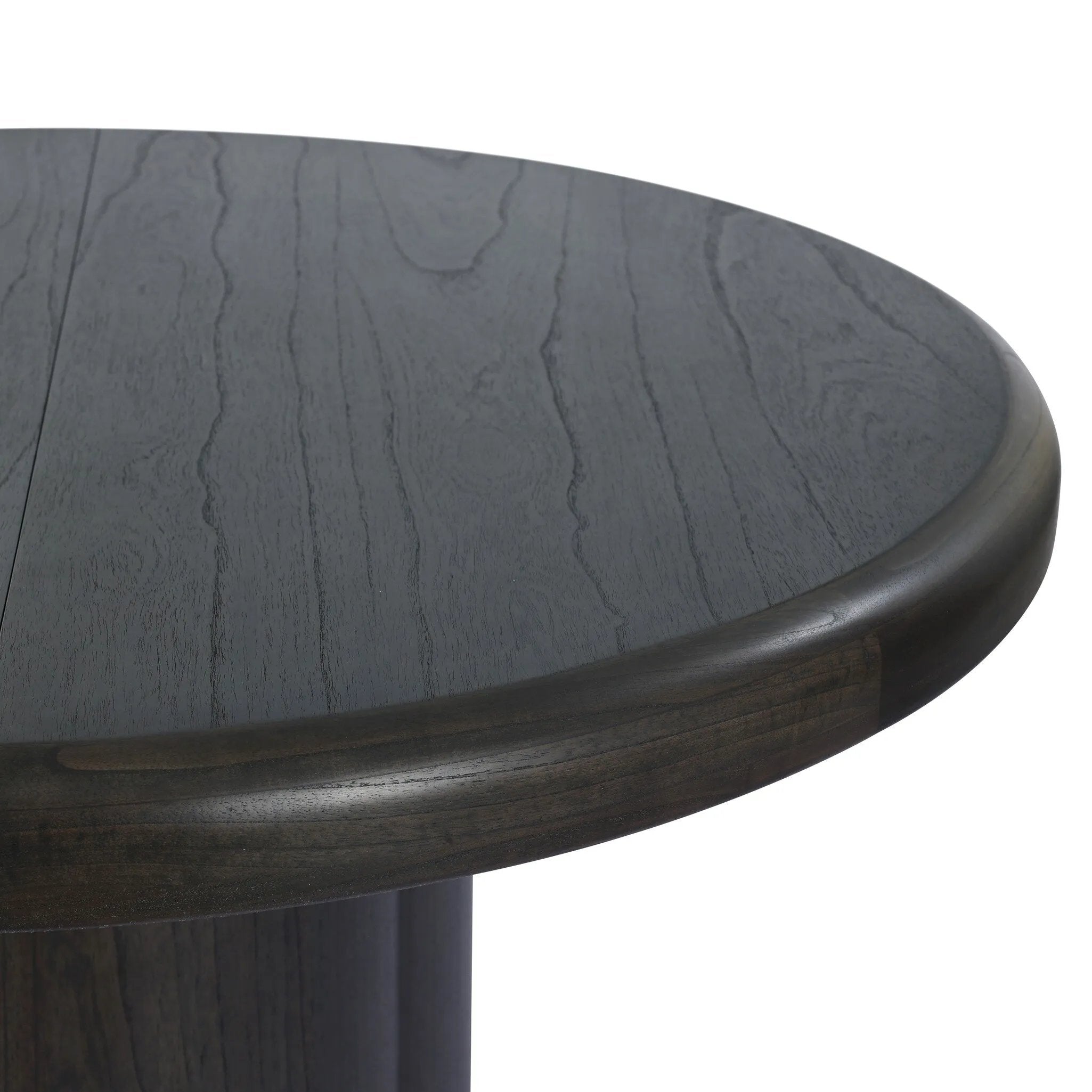 Make space for more guests with a rounded extension table of smoked black mindi, with beautiful visible graining. Inside the tabletop, a hidden mechanism allows for expansion from 48" to 68".As fans of organic modern design at Amethyst, we love the designer inspired Pemble Extension Dining Table - Smoked Black Mindi Veneer. Amethyst Home provides interior design, new home construction design consulting, vintage area rugs, and lighting in the Tampa metro area.