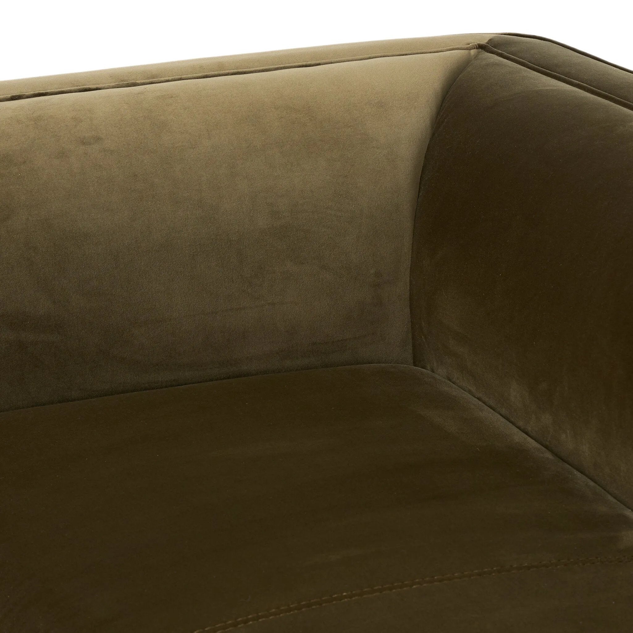 A clean, angular sectional in an eye-catching color. Upholstered in an olive cotton blend, with blind stitching along the seat and back cushions. The slight pronounced seat cushion creates an illusion of being loose, but is actually a fixed cushion with expert tailoring. A piping channel detail gives the arm a finished look Amethyst Home provides interior design, new home construction design consulting, vintage area rugs, and lighting in the Austin metro area.