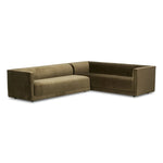 A clean, angular sectional in an eye-catching color. Upholstered in an olive cotton blend, with blind stitching along the seat and back cushions. The slight pronounced seat cushion creates an illusion of being loose, but is actually a fixed cushion with expert tailoring. A piping channel detail gives the arm a finished look Amethyst Home provides interior design, new home construction design consulting, vintage area rugs, and lighting in the Laguna Beach metro area.