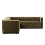 A clean, angular sectional in an eye-catching color. Upholstered in an olive cotton blend, with blind stitching along the seat and back cushions. The slight pronounced seat cushion creates an illusion of being loose, but is actually a fixed cushion with expert tailoring. A piping channel detail gives the arm a finished look Amethyst Home provides interior design, new home construction design consulting, vintage area rugs, and lighting in the San Diego metro area.