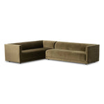 A clean, angular sectional in an eye-catching color. Upholstered in an olive cotton blend, with blind stitching along the seat and back cushions. The slight pronounced seat cushion creates an illusion of being loose, but is actually a fixed cushion with expert tailoring. A piping channel detail gives the arm a finished look Amethyst Home provides interior design, new home construction design consulting, vintage area rugs, and lighting in the Austin metro area.