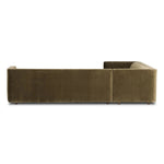 A clean, angular sectional in an eye-catching color. Upholstered in an olive cotton blend, with blind stitching along the seat and back cushions. The slight pronounced seat cushion creates an illusion of being loose, but is actually a fixed cushion with expert tailoring. A piping channel detail gives the arm a finished look Amethyst Home provides interior design, new home construction design consulting, vintage area rugs, and lighting in the Kansas City metro area.