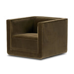 Style meets substance in this olive cotton-blend swivel chair. Blind stitching along the seat and back cushions create a polished complement to the heritage frame. The slight pronounced seat cushion creates an illusion of being loose, but is actually a fixed cushion with expert tailoring. A piping channel detail gives the arm a finished look Amethyst Home provides interior design, new home construction design consulting, vintage area rugs, and lighting in the Laguna Beach metro area.