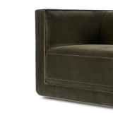 Style meets substance in this olive cotton-blend swivel chair. Blind stitching along the seat and back cushions create a polished complement to the heritage frame. The slight pronounced seat cushion creates an illusion of being loose, but is actually a fixed cushion with expert tailoring. A piping channel detail gives the arm a finished look Amethyst Home provides interior design, new home construction design consulting, vintage area rugs, and lighting in the Scottsdale metro area.