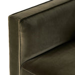 Style meets substance in this olive cotton-blend swivel chair. Blind stitching along the seat and back cushions create a polished complement to the heritage frame. The slight pronounced seat cushion creates an illusion of being loose, but is actually a fixed cushion with expert tailoring. A piping channel detail gives the arm a finished look Amethyst Home provides interior design, new home construction design consulting, vintage area rugs, and lighting in the Washington metro area.