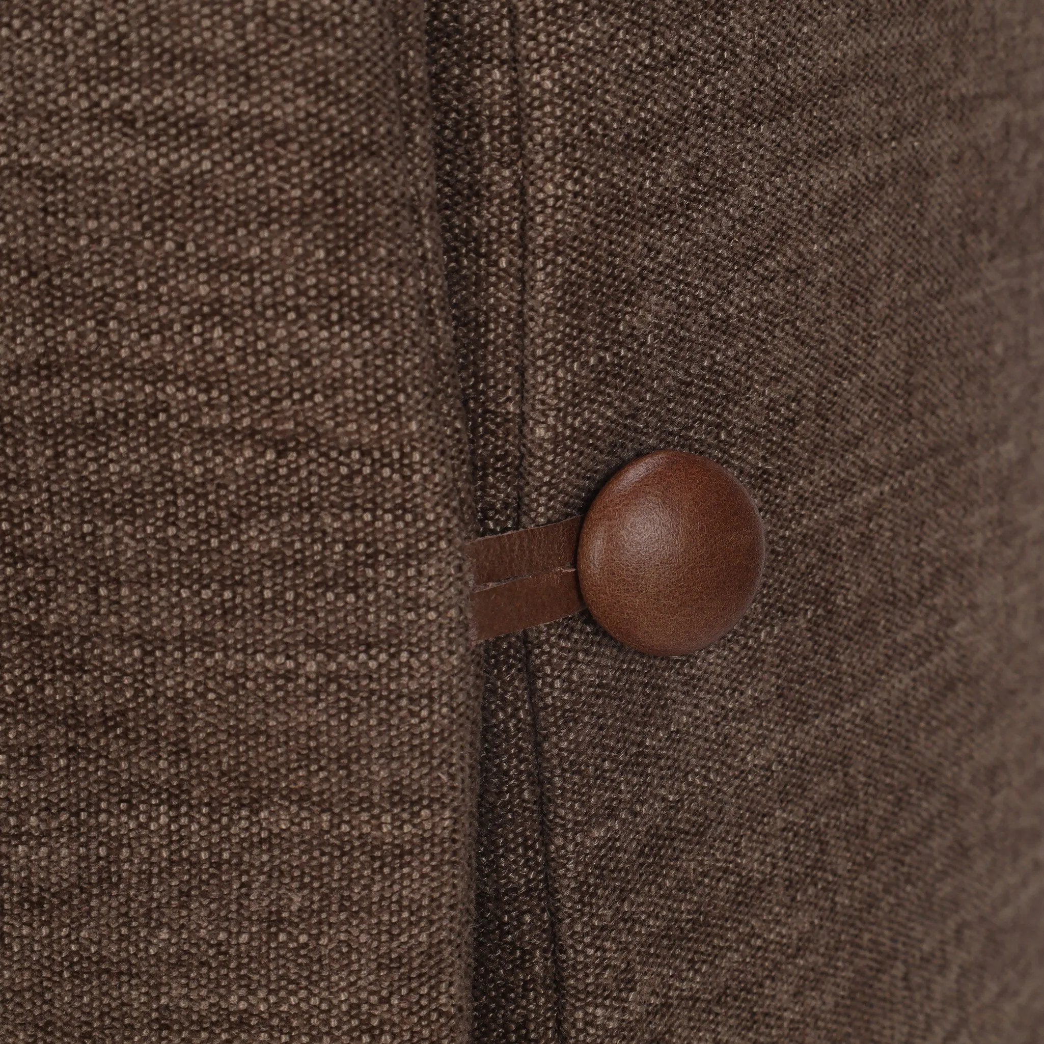This versatile campaign-inspired piece suits any bedroom. A simple square frame shows off tailored modern upholstery of a brown flax/linen fabric, complemented by leather button closure details.As fans of clean style at Amethyst, we love the optimistic inspired Phoebe Bed. Amethyst Home provides interior design, new home construction design consulting, vintage area rugs, and lighting in the Houston metro area.