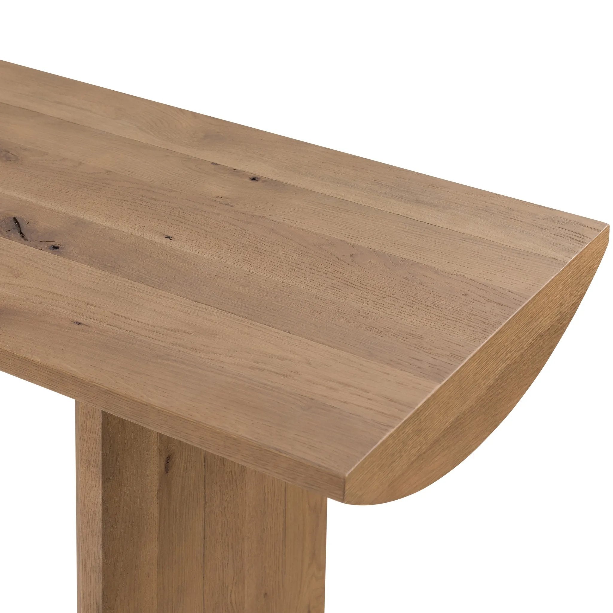 A shape-driven console table made from thick-cut oak veneer features overscale proportions and half-moon shaping, with a warm grey-brown finish Amethyst Home provides interior design, new home construction design consulting, vintage area rugs, and lighting in the Des Moines metro area.