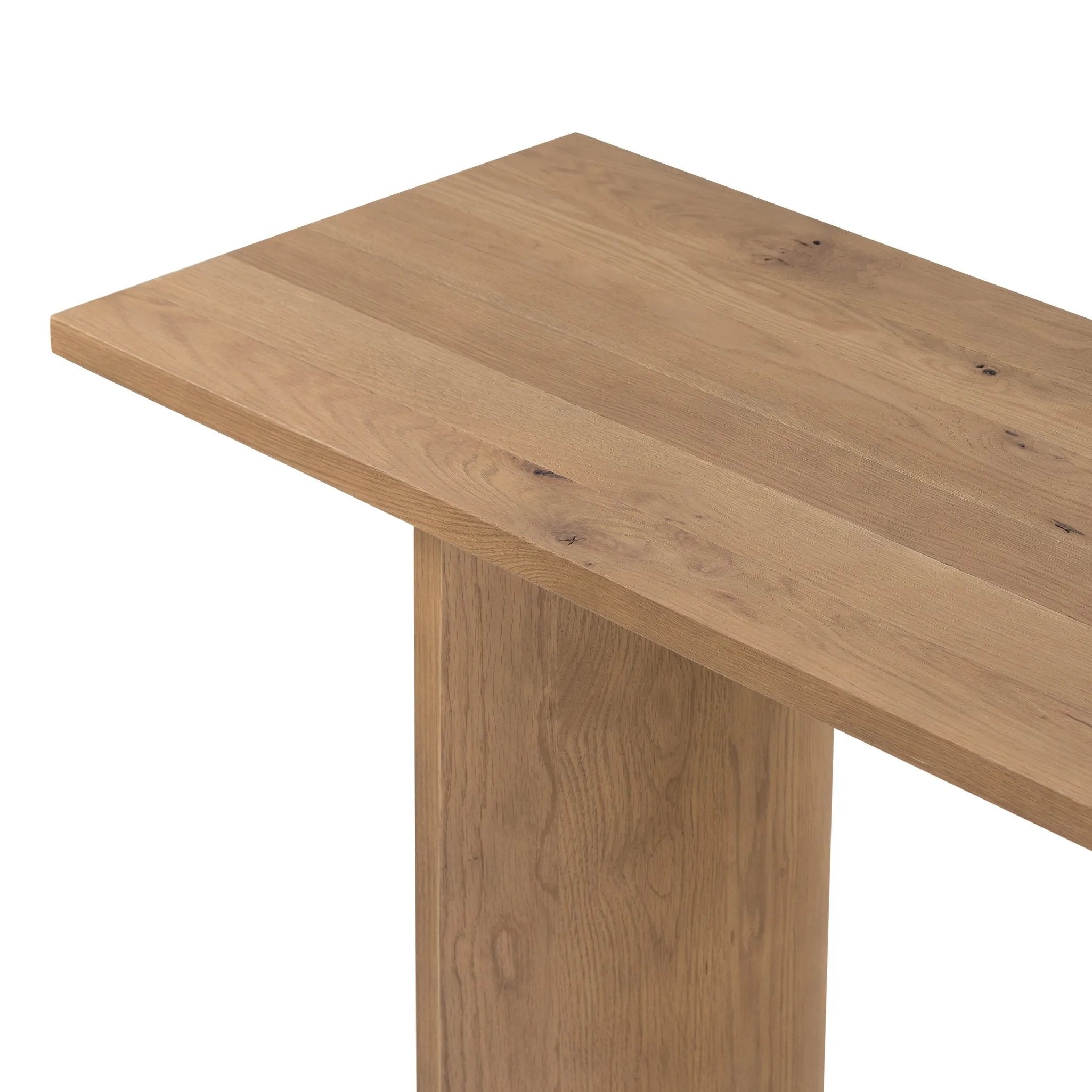 A shape-driven console table made from thick-cut oak veneer features overscale proportions and half-moon shaping, with a warm grey-brown finish Amethyst Home provides interior design, new home construction design consulting, vintage area rugs, and lighting in the Kansas City metro area.