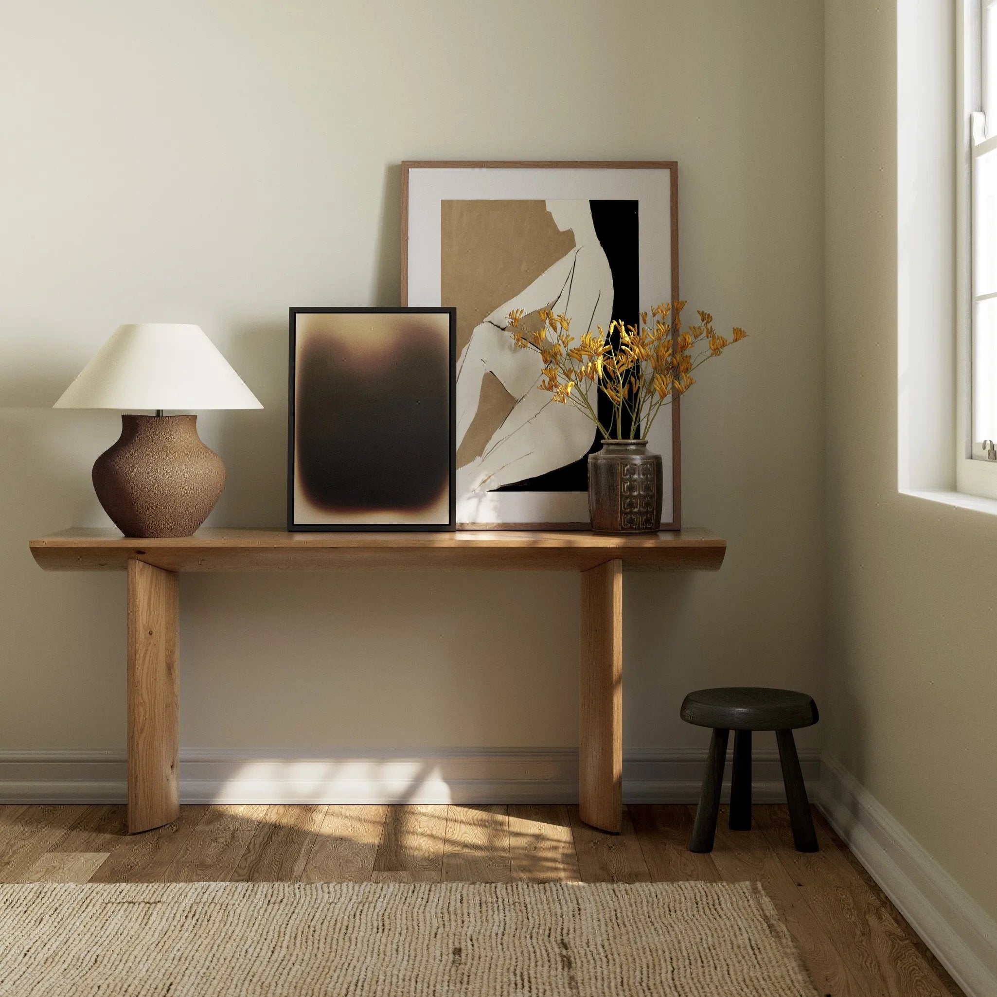 A shape-driven console table made from thick-cut oak veneer features overscale proportions and half-moon shaping, with a warm grey-brown finish Amethyst Home provides interior design, new home construction design consulting, vintage area rugs, and lighting in the Tampa metro area.