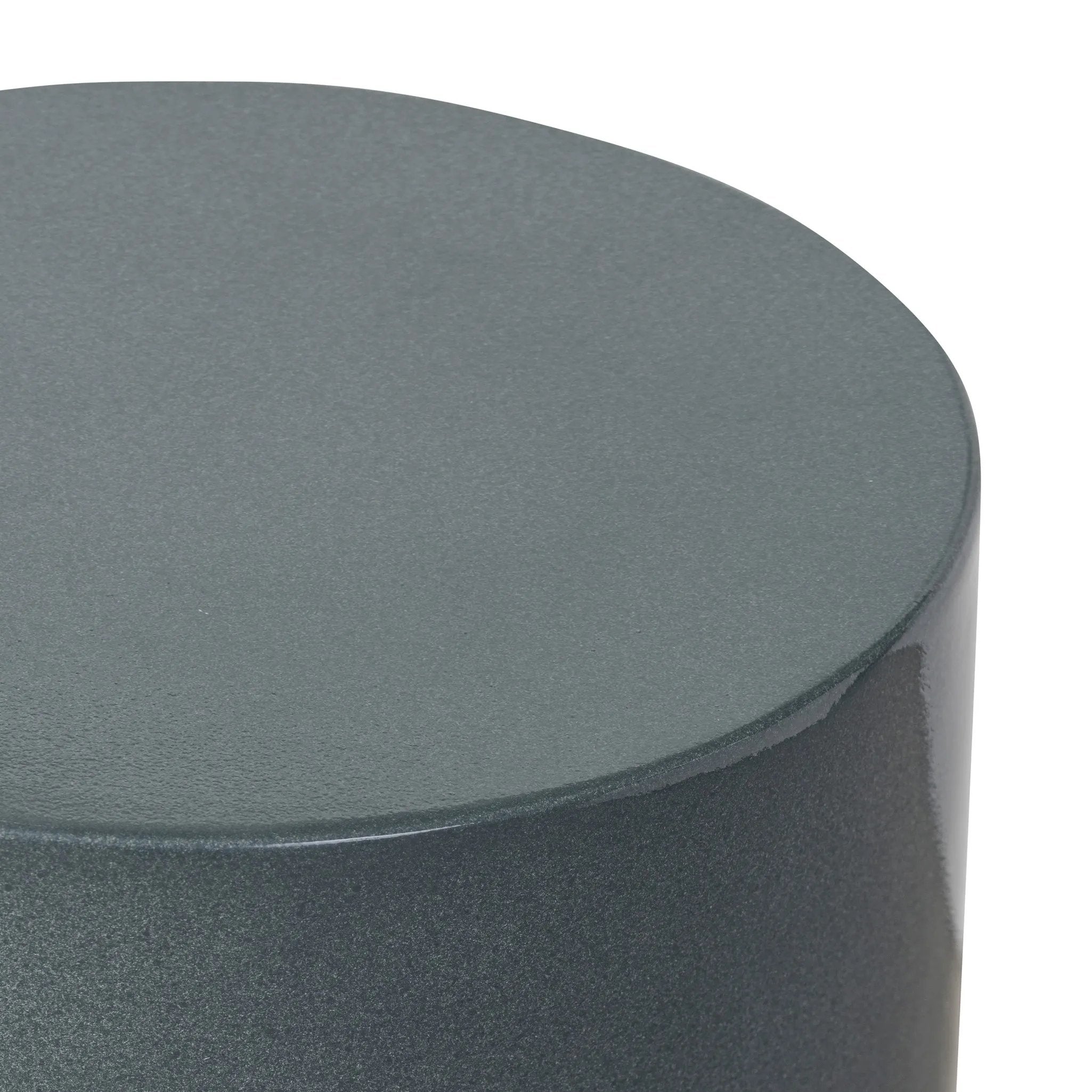 Add an extra surface anywhere with a versatile end table of smooth slate concrete. Its simple shape and smaller scale works into a range of spaces and styles with ease, while a plinth base brings a touch of movement to the whole piece Amethyst Home provides interior design, new home construction design consulting, vintage area rugs, and lighting in the Houston metro area.