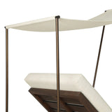 Drawing inspiration from antique rickshaws, this outdoor chaise features wheels and a built-in handle at the front for easy mobility. The adjustable and removable shade canopy offers customizable sun protection, with style. Cover or store inside during inclement weather and when not in use. Amethyst Home provides interior design, new home construction design consulting, vintage area rugs, and lighting in the Portland metro area.