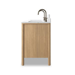 A simple transitional shape designed to function across styles. This bath vanity nods to heritage designs with the softly shaped backsplash, dowel legs, rounded corners and arch frame detail, finished with mixed hardware for added visual interest. Finished with a bath-safe sealant for moisture resistance. Amethyst Home provides interior design, new home construction design consulting, vintage area rugs, and lighting in the Scottsdale metro area.
