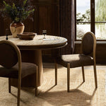 Minimal design, maximum impact. Designed with a subtle nod to midcentury modern, this dining chair features tapered legs, a t