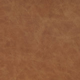 A slim seating style with timeless materials. An armless chair is fully upholstered in butterscotch top-grain leather with a subtle vintage look. Iron legs are also covered in leather, with exposed stitching along each leg. Finished with wooden armrests prime for the head of the table. Amethyst Home provides interior design, new home construction design consulting, vintage area rugs, and lighting in the Scottsdale metro area.