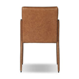 A slim seating style with timeless materials. An armless chair is fully upholstered in butterscotch top-grain leather with a subtle vintage look. Iron legs are also covered in leather, with exposed stitching along each leg.As enthusiasts of luxe design at Amethyst, we love the warm modern inspired Quill Dining Chair. Amethyst Home provides interior design, new home construction design consulting, vintage area rugs, and lighting in the Portland metro area.