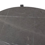 A cradle base of bronze-finished iron supports a pill-shaped tabletop of grey Italian marble, for a classic material mix. Legs shape a squared hourglass with ball detailing in the center, balancing weighty materials with a light look.As lovers of organic modern design at Amethyst, we love the optimistic inspired Rayna Coffee Table. Amethyst Home provides interior design, new home construction design consulting, vintage area rugs, and lighting in the Dallas metro area.