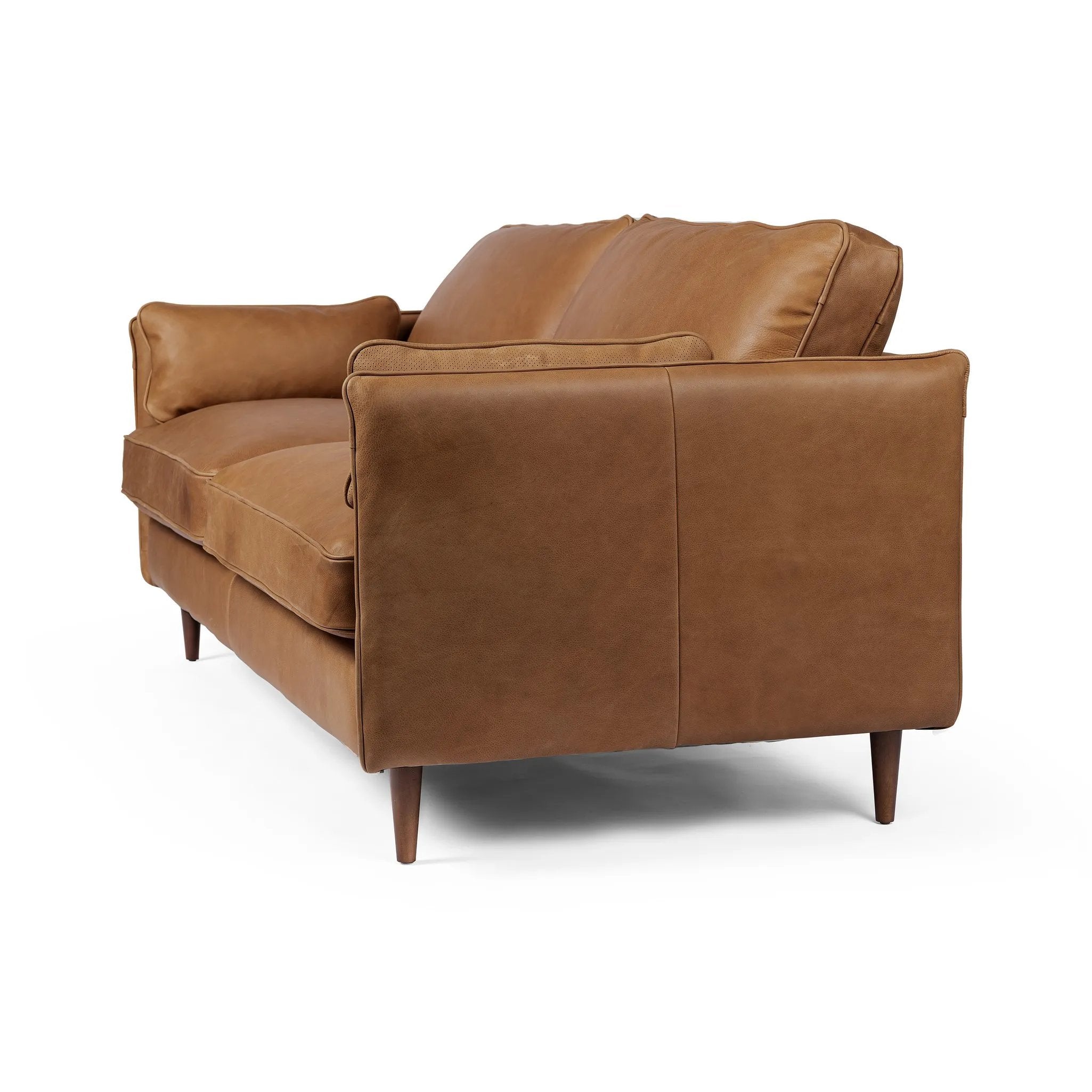 Featuring Reese Palermo Cognac Sofa by Four Hands at Amethyst Home. Effortlessly on-trend. Two-cushion seating of top-grain leather, with knife-edge pillows and welted track arms. Almond-finished legs taper for a modern touch atop midcentury influence.Overall Dimensions: 76.00"w x 35.00"d x 32.75"hWeight : 110.89 lbsMaterials: Top Grain Leather, Poplar Ply. Amethyst Home provides interior design, new home construction design consulting, vintage area rugs, and lighting in the Des Moines metro area.