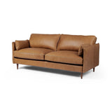 Featuring Reese Palermo Cognac Sofa by Four Hands at Amethyst Home. Effortlessly on-trend. Two-cushion seating of top-grain leather, with knife-edge pillows and welted track arms. Almond-finished legs taper for a modern touch atop midcentury influence.Overall Dimensions: 76.00"w x 35.00"d x 32.75"hWeight : 110.89 lbsMaterials: Top Grain Leather, Poplar Plyw. Amethyst Home provides interior design, new home construction design consulting, vintage area rugs, and lighting in the Nashville metro area.