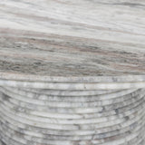 A bold, sculptural presence with movement throughout. This solid marble table features a stacked fluted base and bullnose-edged top that combine to let the natural variation of the material take center stage.As fans of clean design at Amethyst, we love the nature inspired Reeves Dining Table - River Grey Marble. Amethyst Home provides interior design, new home construction design consulting, vintage area rugs, and lighting in the Des Moines metro area.