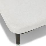 A campaign-inspired outdoor chaise transforms any space into your personal retreat. Monochromatic strap detailing wraps a sleek, minimalist frame, with a linen-like cushion upholstered in high-performance Italian fabric. Designed to elevate your outdoor space with a resort-like ease. Amethyst Home provides interior design, new home construction design consulting, vintage area rugs, and lighting in the Laguna Beach metro area.