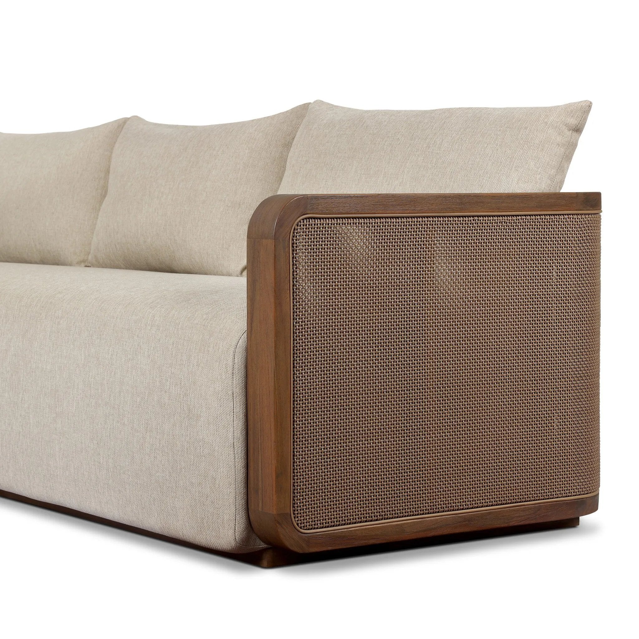 Softness is the story of this mixed material outdoor sofa. With thick, sink-in cushioning and loose pillows on the seatback, the silhouette comes together with a barrel-shaped, FSC®-certified teak frame featuring a crosshatch cane panel. Cover or store inside during inclement weather and when not in use. Amethyst Home provides interior design, new home construction design consulting, vintage area rugs, and lighting in the Des Moines metro area.