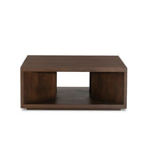 A coffee table crafted of solid mango with a warm brown finish. Simple, modern shaping to easily suit a range of styles and spaces. Great alone or paired.As lovers of organic modern aesthetics at Amethyst, we love the designer inspired Rico Coffee Table - Warm Brown Mango. Amethyst Home provides interior design, new home construction design consulting, vintage area rugs, and lighting in the Scottsdale metro area.