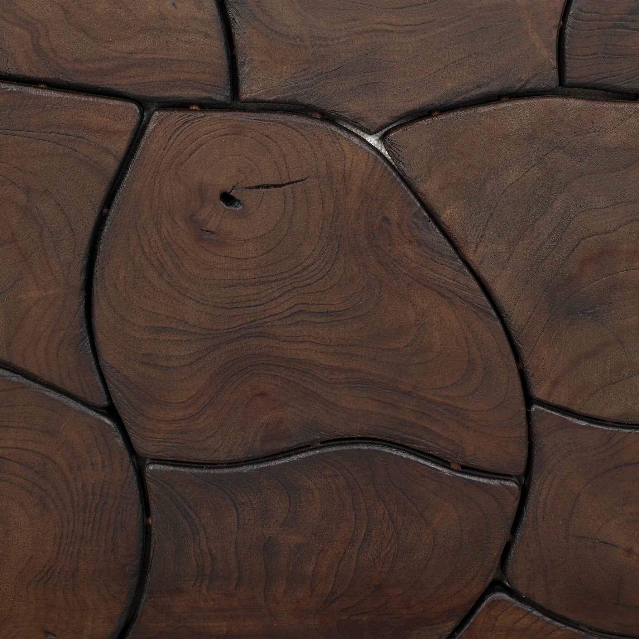 Inset panels of solid teak root are laminated to create a mosaic look against beautiful natural graining. Between angled armrests, cushioned seating is upholstered in a durable Italian fabric for an elevated look with a linen hand feel. Amethyst Home provides interior design, new home construction design consulting, vintage area rugs, and lighting in the Alpharetta metro area.