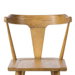 A fresh, bar-style take on mid-century Windsor seating, featuring a bowed, sculptural silhouette and soft black finish to highlight the natural grain of weathered oak Amethyst Home provides interior design, new home construction design consulting, vintage area rugs, and lighting in the Laguna Beach metro area.