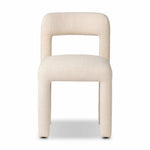 Fit for modern dining, this clean-styled chair is fully upholstered in a specialized performance fabric. An open back connects down to the cylindrical legs. Slight scale and squared off shape are great for smaller dining areas. Amethyst Home provides interior design, new home construction design consulting, vintage area rugs, and lighting in the Kansas City metro area.