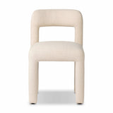 Fit for modern dining, this clean-styled chair is fully upholstered in a specialized performance fabric. An open back connects down to the cylindrical legs. Slight scale and squared off shape are great for smaller dining areas. Amethyst Home provides interior design, new home construction design consulting, vintage area rugs, and lighting in the Kansas City metro area.