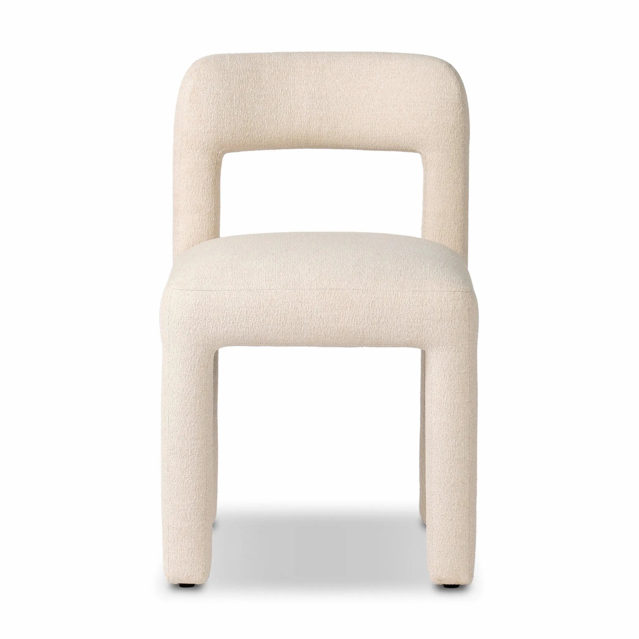 Fit for modern dining, this clean-styled chair is fully upholstered in a specialized performance fabric. An open back connects down to the cylindrical legs. Slight scale and squared off shape are great for smaller dining areas. Amethyst Home provides interior design, new home construction design consulting, vintage area rugs, and lighting in the Kansas City metro area.