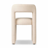 Fit for modern dining, this clean-styled chair is fully upholstered in a specialized performance fabric. An open back connects down to the cylindrical legs. Slight scale and squared off shape are great for smaller dining areas. Amethyst Home provides interior design, new home construction design consulting, vintage area rugs, and lighting in the Omaha metro area.