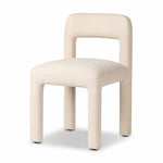 Fit for modern dining, this clean-styled chair is fully upholstered in a specialized performance fabric. An open back connects down to the cylindrical legs. Slight scale and squared off shape are great for smaller dining areas. Amethyst Home provides interior design, new home construction design consulting, vintage area rugs, and lighting in the Seattle metro area.