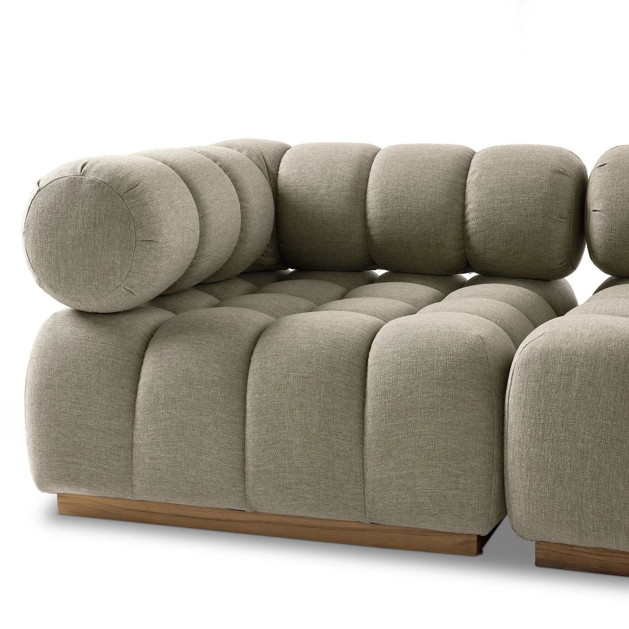 A modern take on mid-century Italian design, soft volume and exaggerated proportions fuse for a sculpted look and playful feel. Atop a plinth-style teak base, outdoor-friendly five-piece sectional features dramatic tufting for a padded sit, indoors and out. Amethyst Home provides interior design, new home construction design consulting, vintage area rugs, and lighting in the Los Angeles metro area.