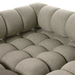 A modern take on mid-century Italian design, soft volume and exaggerated proportions fuse for a sculpted look and playful feel. Atop a plinth-style teak base, outdoor-friendly five-piece sectional features dramatic tufting for a padded sit, indoors and out. Amethyst Home provides interior design, new home construction design consulting, vintage area rugs, and lighting in the Nashville metro area.
