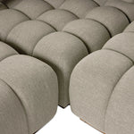 A modern take on mid-century Italian design, soft volume and exaggerated proportions fuse for a sculpted look and playful feel. Atop a plinth-style teak base, outdoor-friendly five-piece sectional features dramatic tufting for a padded sit, indoors and out. Amethyst Home provides interior design, new home construction design consulting, vintage area rugs, and lighting in the Seattle metro area.