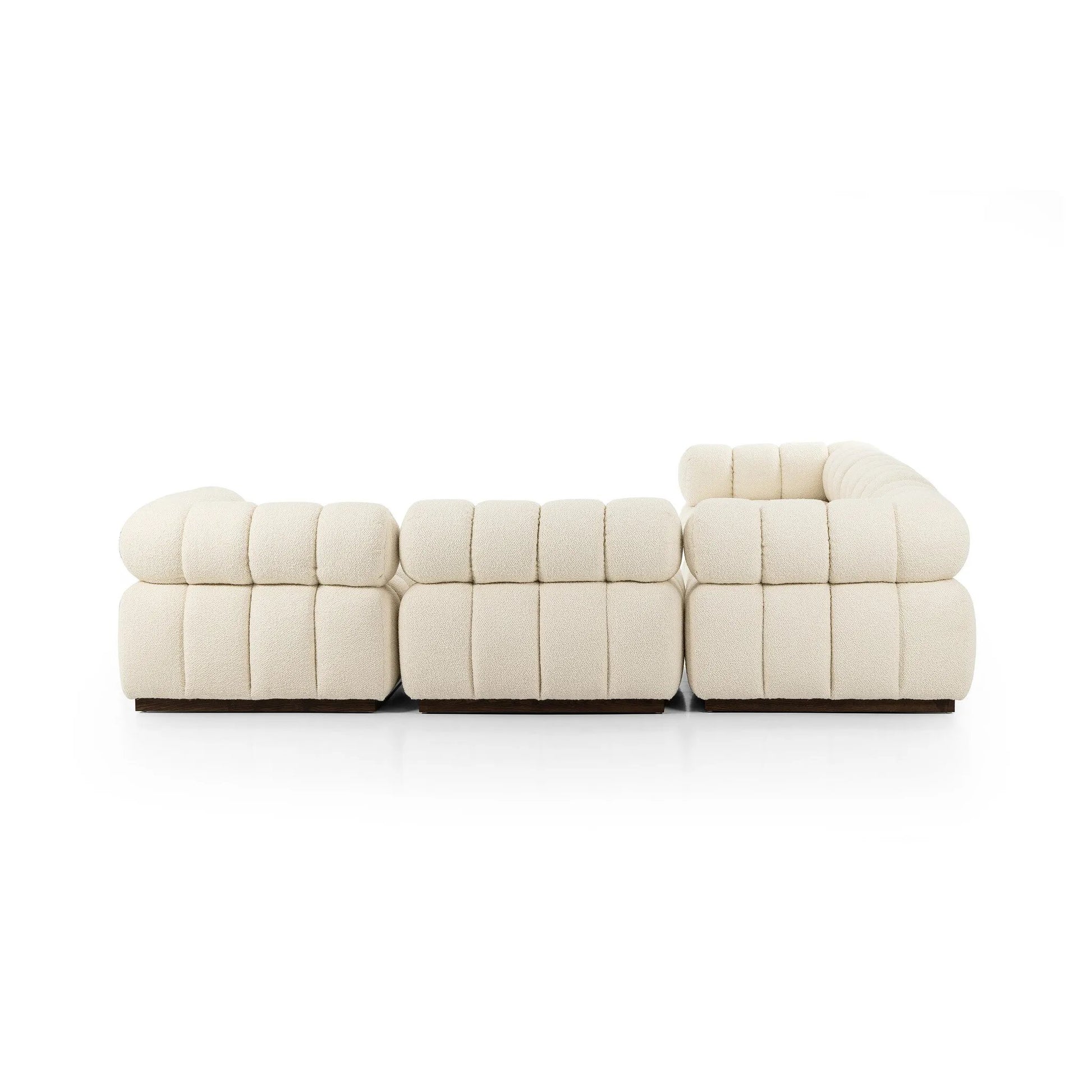 A modern take on mid-century Italian design, soft volume and exaggerated proportions fuse for a sculpted look and playful feel on this five-piece sectional. Atop a plinth-style ash base, softly textured upholstery features dramatic tufting for a padded sit. For indoor use only Amethyst Home provides interior design, new home construction design consulting, vintage area rugs, and lighting in the Nashville metro area.