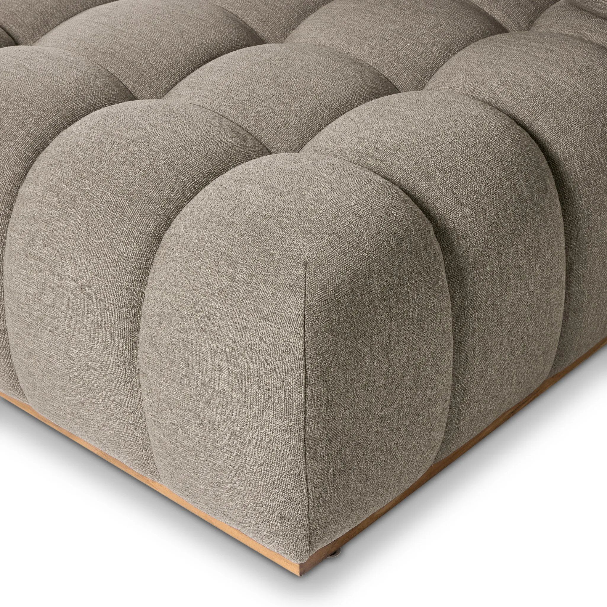 Featuring Roma Outdoor Sectional Alessi Fawn by Four Hands at Amethyst Home. A modern take on mid-century Italian design, soft volume and exaggerated proportions fuse for a sculpted look and playful feel. Atop a plinth-style teak base, outdoor-friendly ottoman features dramatic tufting for a padded sit or a tray for use as a table, indoors and out. Ottoman to m. Amethyst Home provides interior design, new home construction design consulting, vintage area rugs, and lighting in the Omaha metro area.