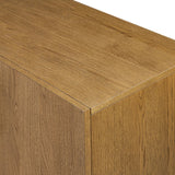 Amber-finished oak forms a clean silhouette with plenty of storage, accented with long iron hardware wrapped in black top-grain leather. Outset legs add an element of interest. Rear cutouts for cord management Amethyst Home provides interior design, new home construction design consulting, vintage area rugs, and lighting in the Kansas City metro area.