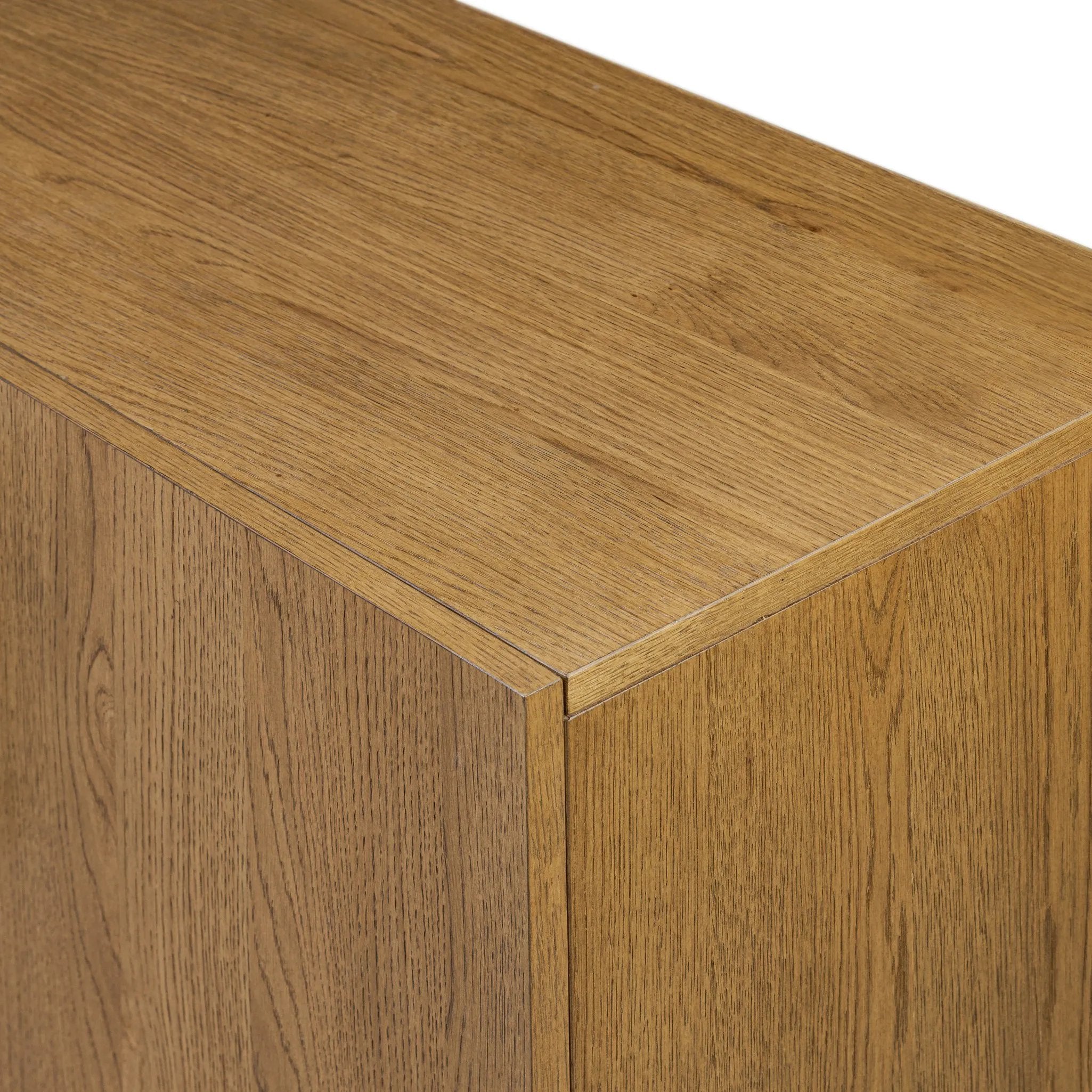 Amber-finished oak forms a clean silhouette with plenty of storage, accented with long iron hardware wrapped in black top-grain leather. Outset legs add an element of interest. Rear cutouts for cord management Amethyst Home provides interior design, new home construction design consulting, vintage area rugs, and lighting in the Kansas City metro area.